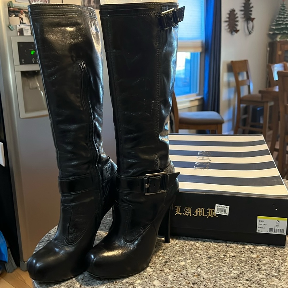 LAMB platform black leather boots.